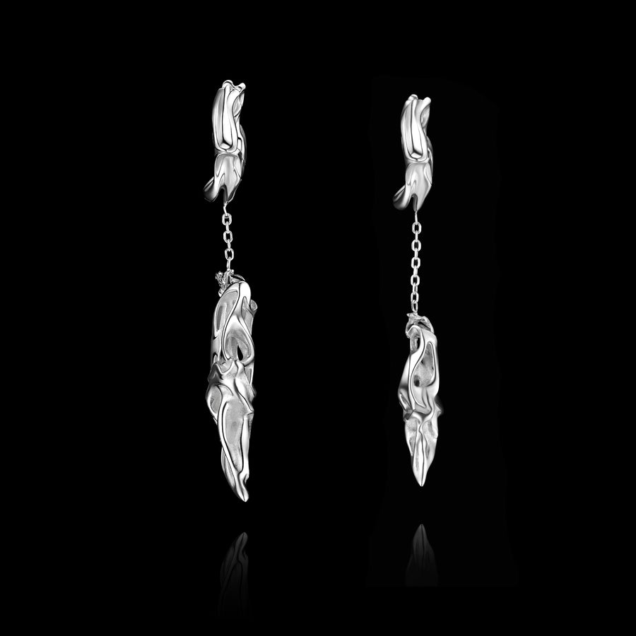 Tiger Tooth Earrings · Sterling Silver